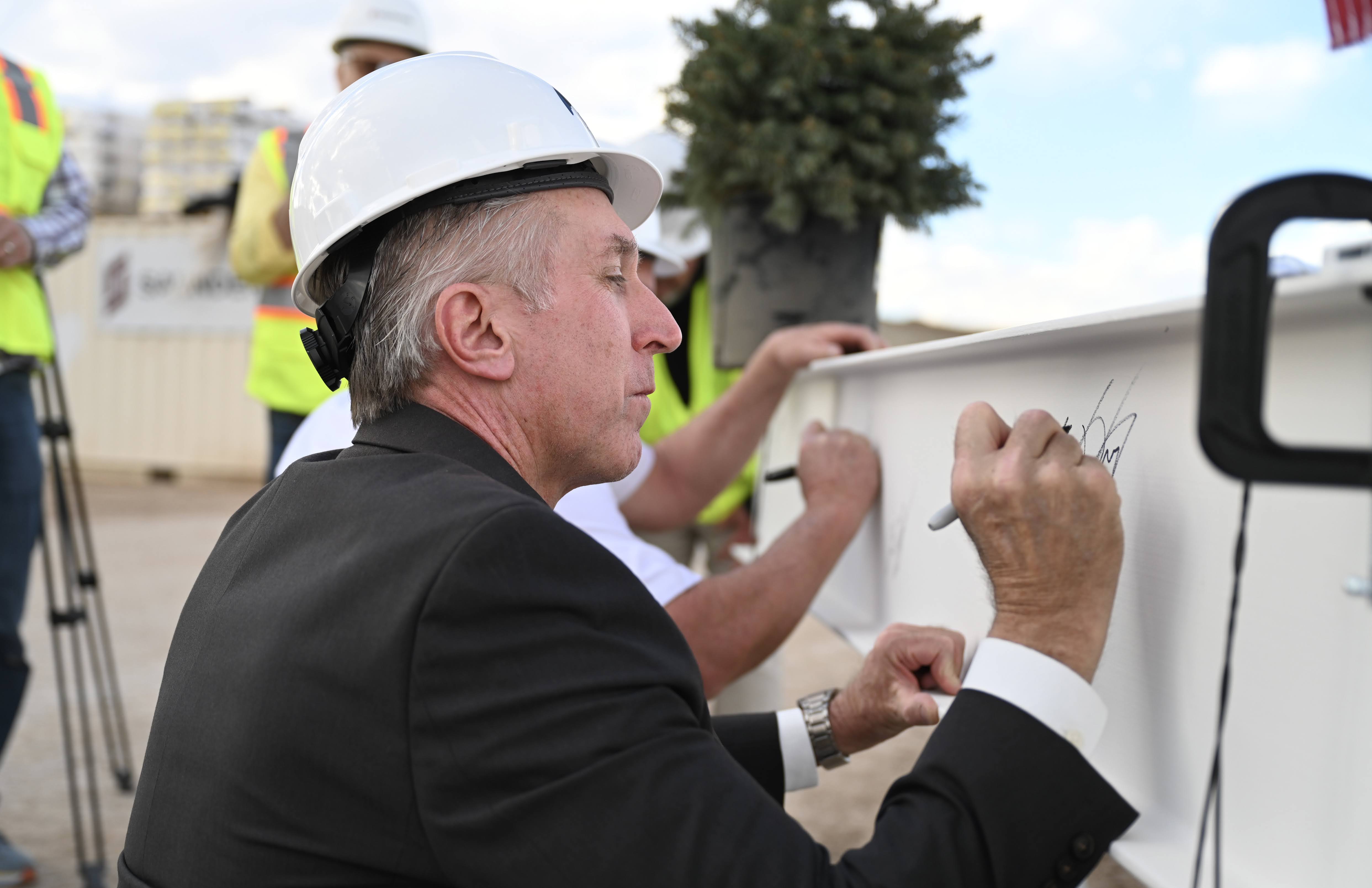 Tim Dietz signing the ceremonial beam at the Castle Rock Sports Complex Topping Out