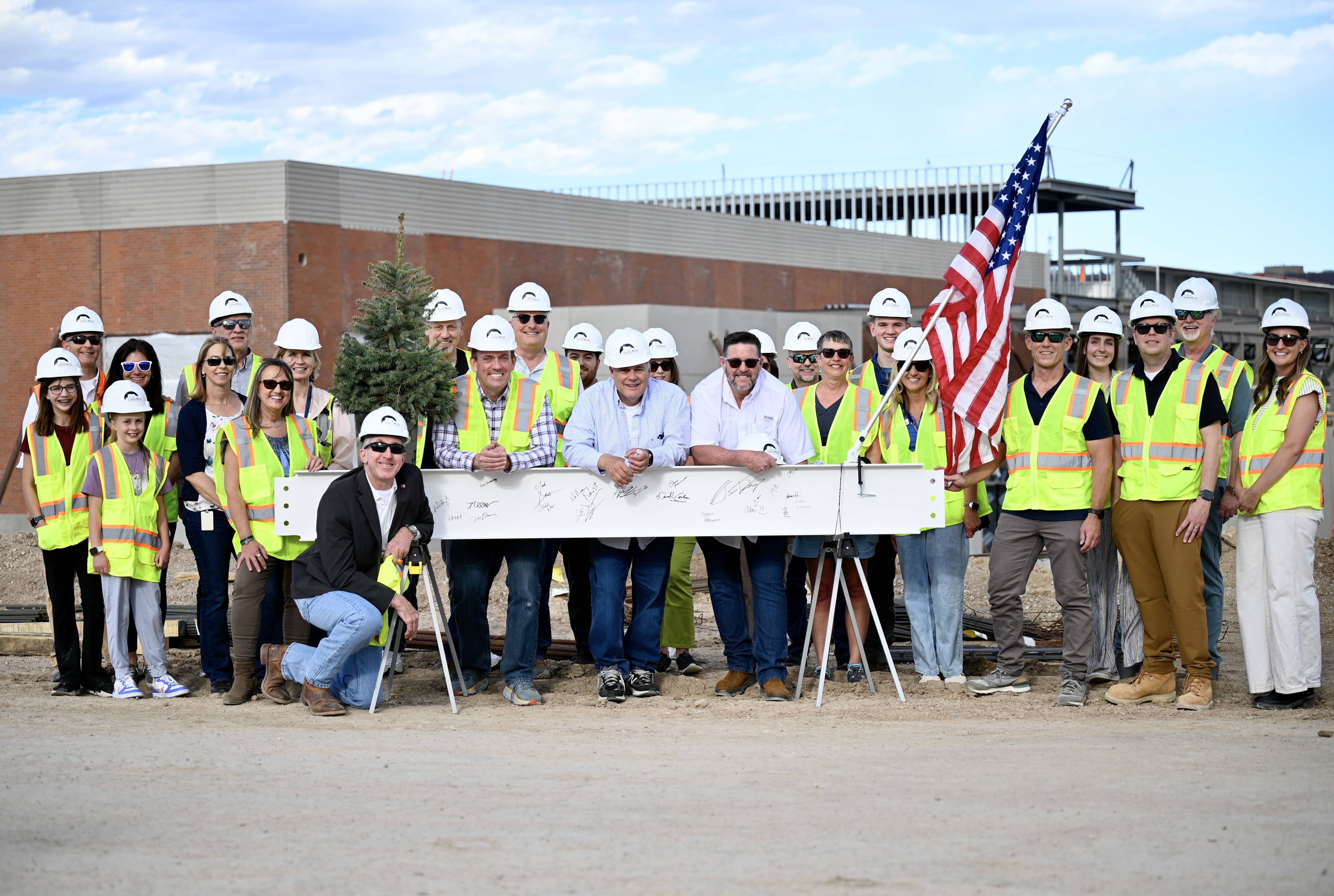 Tim Dietz with the group at the Castle Rock Sports Complex Topping Out ceremony