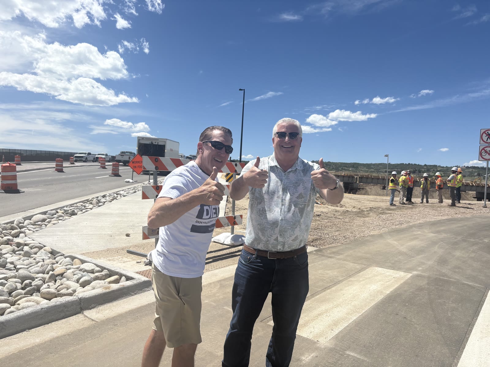 Tim Dietz giving a thumbs up at the newly opened Crystal Valley Interchange at I-25 in Castle Rock on opening day