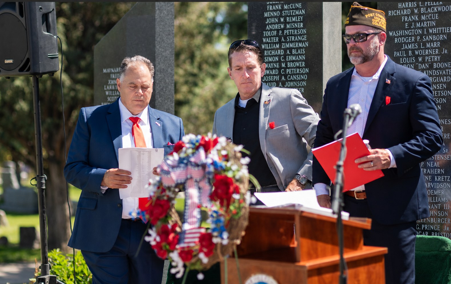 Tim Dietz with Castle Rock Mayor Jason Gray and VFW Commander Brian Guenther at the Cedar Hill Cemetery Veterans Memorial wreath