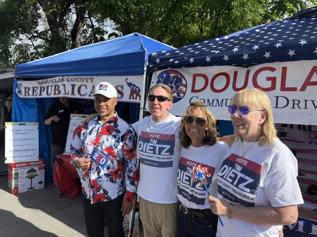 Tim Dietz with supporters at the Douglas County Republicans booth at Parker Days, all wearing Vote Tim Dietz campaign t-shirts